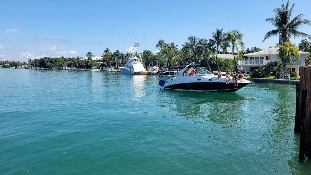 a group of people on a boat in the water